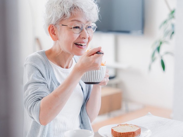 Woman enjoying a healthy breakfast