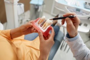 Woman learning more about dental implants